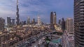 Dubai Downtown skyline day to night timelapse with Burj Khalifa and other towers paniramic view from the top in Dubai Royalty Free Stock Photo