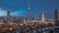 Dubai Downtown skyline day to night timelapse with Burj Khalifa and other towers paniramic view from the top in Dubai Royalty Free Stock Photo