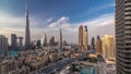 Dubai Downtown skyline day to night timelapse with Burj Khalifa and other towers paniramic view from the top in Dubai Royalty Free Stock Photo