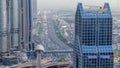 Dubai downtown skyline day to night timelapse and Sheikh Zayed road traffic, UAE Royalty Free Stock Photo