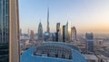 Dubai downtown skyline day to night timelapse with tallest building and Sheikh Zayed road traffic, UAE Royalty Free Stock Photo