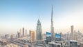 Dubai downtown skyline day to night timelapse with tallest building and Sheikh Zayed road traffic, UAE Royalty Free Stock Photo