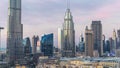 Dubai Downtown skyline day to night timelapse with towers panoramic view from the top in Dubai Royalty Free Stock Photo