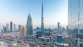 Dubai downtown skyline day to night timelapse with tallest building and Sheikh Zayed road traffic, UAE Royalty Free Stock Photo