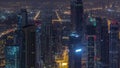 Dubai Downtown skyline futuristic cityscape with many skyscrapers and Burj Khalifa aerial night to day timelapse. Royalty Free Stock Photo