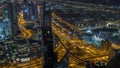 Dubai Downtown skyline futuristic cityscape with many skyscrapers and Burj Khalifa aerial night to day timelapse. Royalty Free Stock Photo