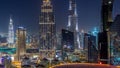 Dubai downtown skyline night with tallest building and Sheikh Zayed road traffic, UAE Royalty Free Stock Photo