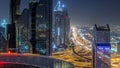 Dubai downtown skyline night timelapse and Sheikh Zayed road traffic, UAE Royalty Free Stock Photo