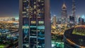 Dubai downtown skyline night timelapse with tallest building and Sheikh Zayed road traffic, UAE Royalty Free Stock Photo