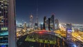 Dubai downtown skyline night timelapse with tallest building and Sheikh Zayed road traffic, UAE Royalty Free Stock Photo