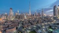 Dubai Downtown skyline night to day timelapse with Burj Khalifa and other towers paniramic view from the top in Dubai Royalty Free Stock Photo