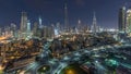 Dubai Downtown skyline night to day timelapse with Burj Khalifa and other towers panoramic view from the top in Dubai Royalty Free Stock Photo