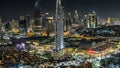 Dubai downtown skyline timelapse at night. Rooftop view of Sheikh Zayed road with numerous illuminated towers. Royalty Free Stock Photo