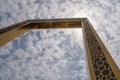 The Dubai Frame modern architecture in downtown golden color on a blue sky sunny day