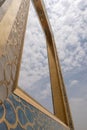 The Dubai Frame modern architecture in downtown golden color on a blue sky sunny day