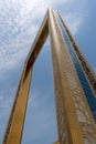 The Dubai Frame modern architecture in downtown golden color on a blue sky sunny day