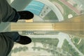 The Dubai Frame modern architecture glass floor looking down 150m to the base of the building