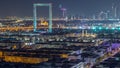 Dubai Frame with Zabeel Masjid mosque illuminated at night timelapse. Royalty Free Stock Photo