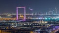 Dubai Frame with Zabeel Masjid mosque illuminated at night timelapse. Royalty Free Stock Photo