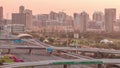 Dubai Golf Course with a cityscape of Greens and tecom districts at the background aerial timelapse Royalty Free Stock Photo