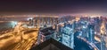 Dubai Horizon Lights Glowing in a hazy night with a beautiful panoramic Towers rooftop view