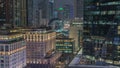 Dubai International Financial district aerial night timelapse. View of business and financial office towers. Royalty Free Stock Photo
