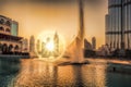 Dubai lagoon with fountain against sunset in UAE Royalty Free Stock Photo