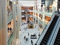 Dubai Mall modern interior design, the biggest mall in the world - Tourist attractions and landmarks in Dubai, UAE - people shoppi Royalty Free Stock Photo