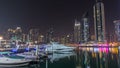 Dubai marina bay with yachts an boats night Royalty Free Stock Photo