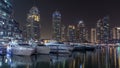 Dubai marina bay with yachts an boats night Royalty Free Stock Photo