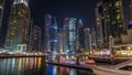 Dubai marina bay with yachts an boats night Royalty Free Stock Photo