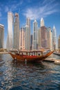 Dubai Marina with boats against skyscrapers in Dubai, United Arab Emirates Royalty Free Stock Photo
