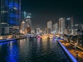 Dubai Marina, harbour, cruise boat and canal promenade view at night, in Dubai, United Arab Emirates Royalty Free Stock Photo