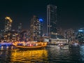 Dubai Marina, harbour, cruise boat and canal promenade view at night, in Dubai, United Arab Emirates Royalty Free Stock Photo