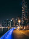 Dubai Marina, harbour, cruise boat and canal promenade view at night, in Dubai, United Arab Emirates Royalty Free Stock Photo