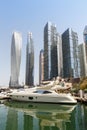 Dubai Marina and Harbour skyline architecture wealth luxury travel in United Arab Emirates with boat yacht portrait format Royalty Free Stock Photo