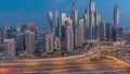 Dubai Marina highway intersection spaghetti junction night to day Royalty Free Stock Photo