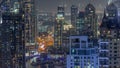 Dubai Marina and Media City districts with modern skyscrapers and office buildings aerial night timelapse. Royalty Free Stock Photo