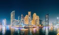 Dubai Marina Port, UAE, United Arab Emirates - May 19, 2021: Beautiful Night view of high-rise buildings of residential Royalty Free Stock Photo