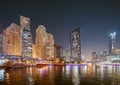 Dubai Marina Port, UAE, United Arab Emirates - May 19, 2021: Night view of high-rise buildings of residential district Royalty Free Stock Photo