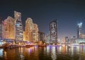 Dubai Marina Port, UAE, United Arab Emirates - May 19, 2021: Night view of high-rise buildings of residential district Royalty Free Stock Photo