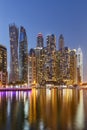 Dubai Marina skyline architecture buildings travel at night twilight in United Arab Emirates portrait format Royalty Free Stock Photo