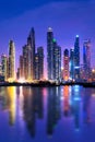 Dubai marina skyline at night with water reflections, United Arab Emirates Royalty Free Stock Photo