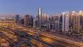 Dubai Marina skyscrapers aerial top view before sunrise from JLT in Dubai night to day timelapse, UAE. Royalty Free Stock Photo