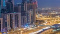 Dubai Marina skyscrapers aerial top view before sunrise from JLT in Dubai night to day timelapse, UAE. Royalty Free Stock Photo