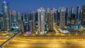 Dubai Marina skyscrapers aerial top view during sunrise from JLT in Dubai night to day timelapse, UAE. Royalty Free Stock Photo
