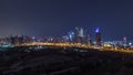 Dubai Marina skyscrapers and golf course all night timelapse, Dubai, United Arab Emirates Royalty Free Stock Photo