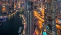 Dubai Marina skyscrapers and jumeirah lake towers view from the top aerial night to day timelapse in the United Arab Royalty Free Stock Photo