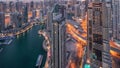 Dubai Marina skyscrapers and jumeirah lake towers view from the top aerial night to day timelapse in the United Arab Royalty Free Stock Photo