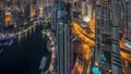 Dubai Marina skyscrapers and jumeirah lake towers view from the top aerial night to day timelapse in the United Arab Royalty Free Stock Photo